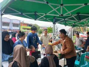 pasar-murah-aman-pekanbaru-di-perhentian-marpoyan-disambut-antusias-warga-1793423828